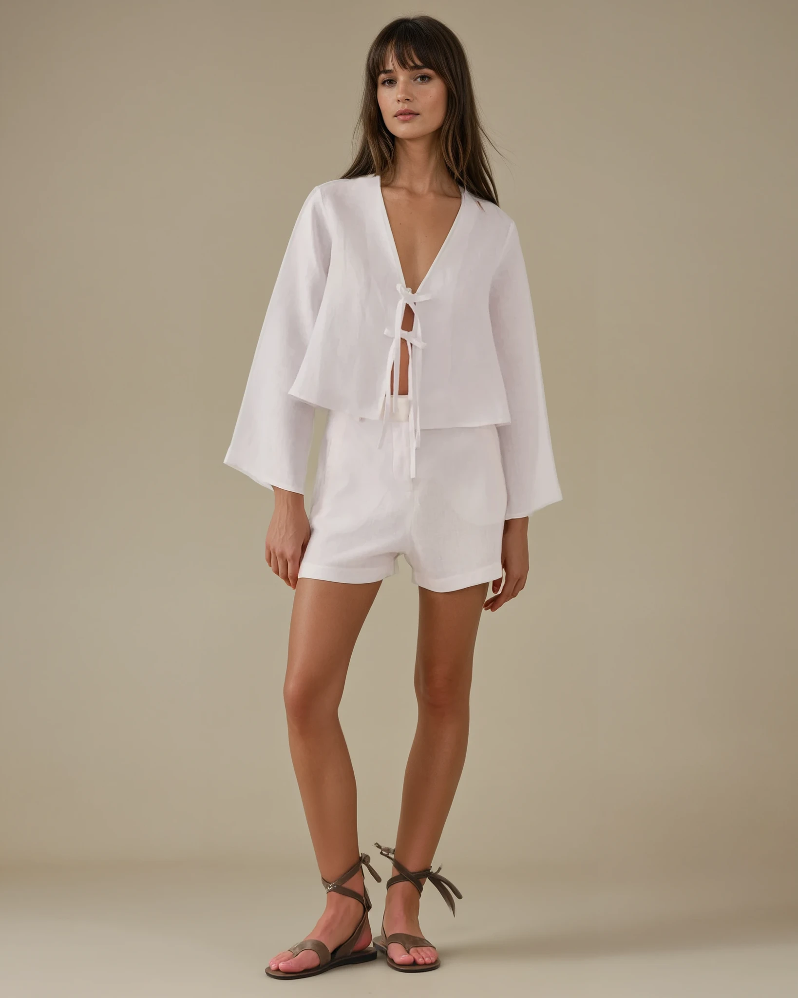 Woman wearing a white linen elegant set