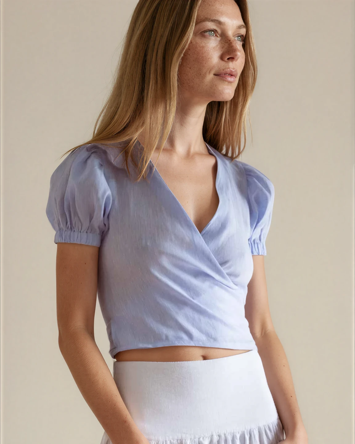 Woman wearing a light blue top 