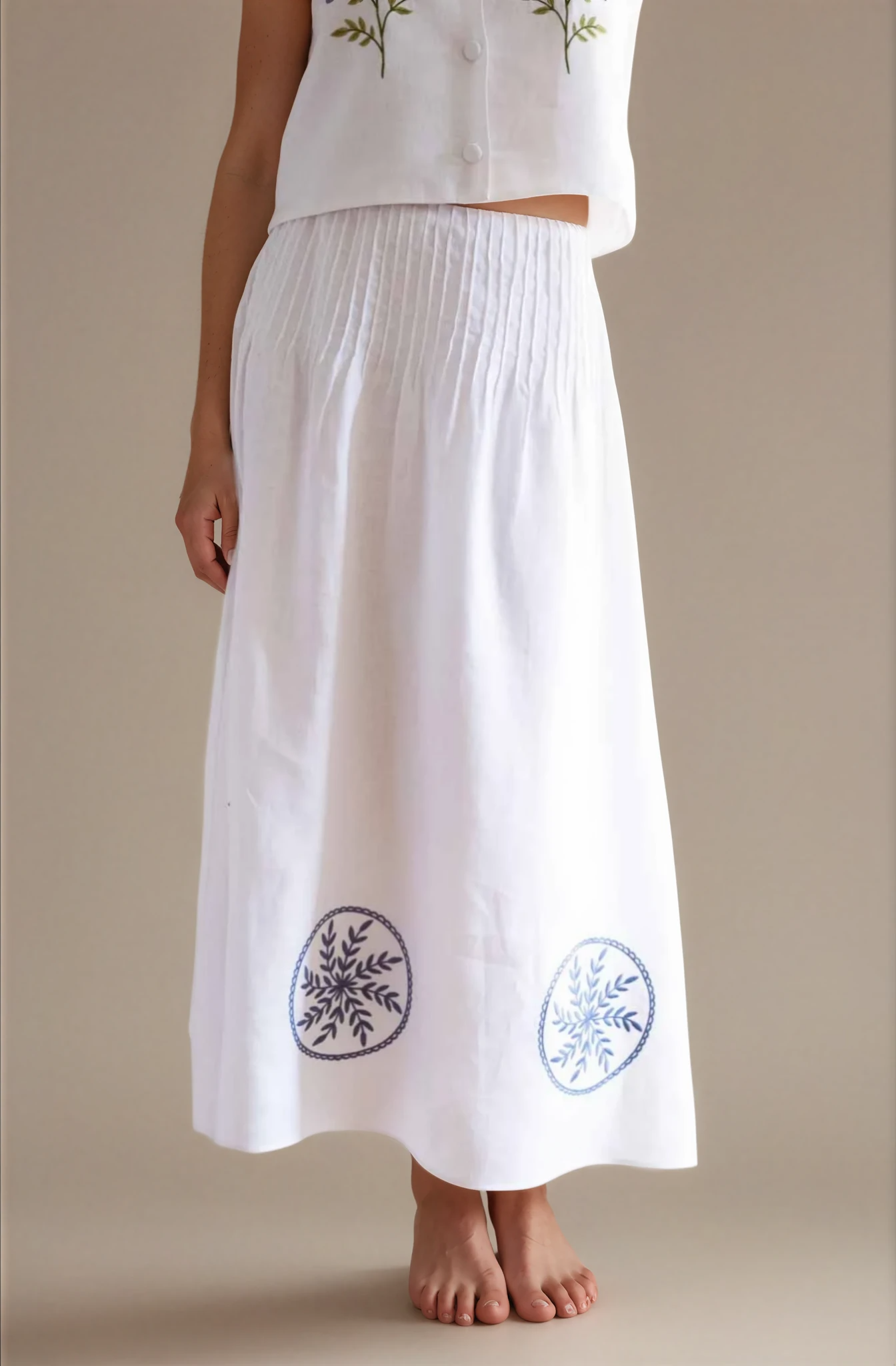 White linen midi skirt with blue flower embroidery 