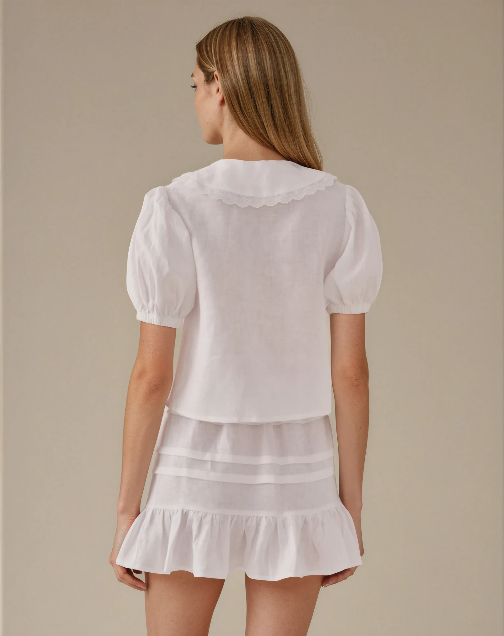 white femenine blouse matching skirt linen