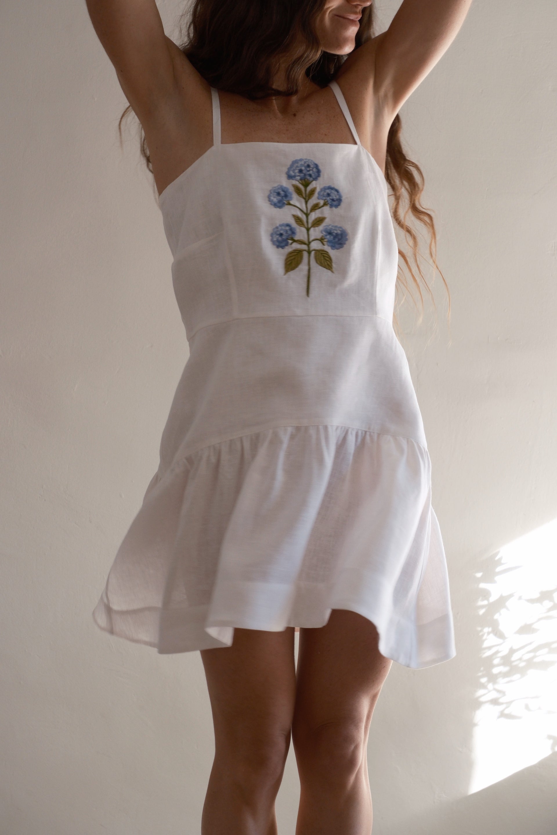 Embroidered linen dress from Hydrangea SS26 collection